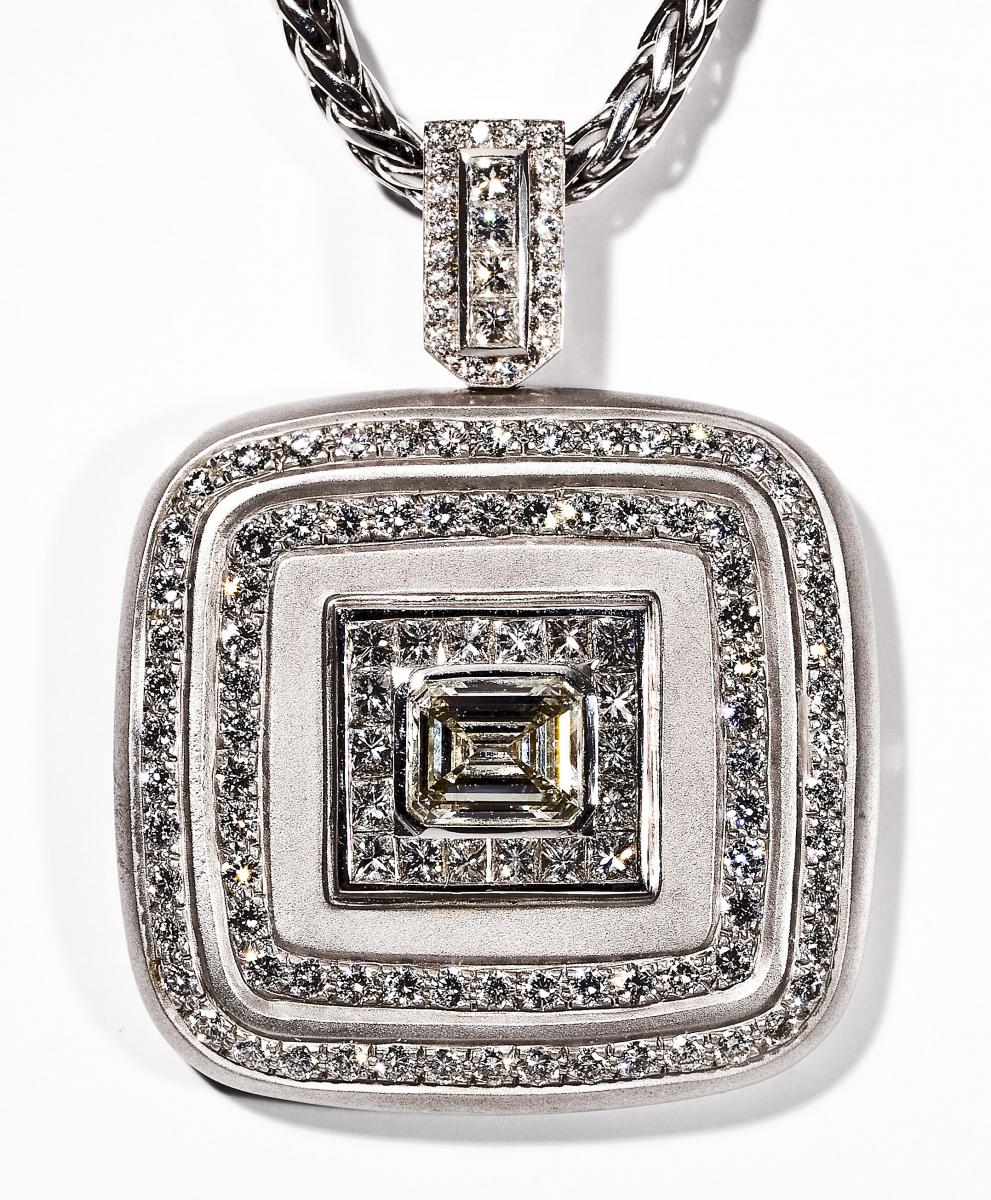 8.24 ctw Diamond Pendant ($10,000-15,000)